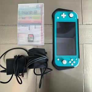 Like new Turquoise Nintendo Switch Lite w/ Animal Crossing, Luigi’s Mansion